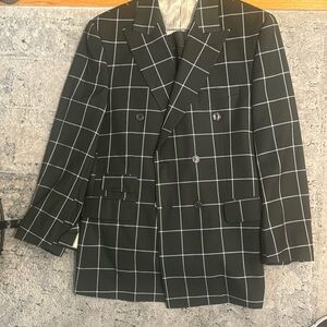 This is a 2 piece men suit in a size 38R/32R.